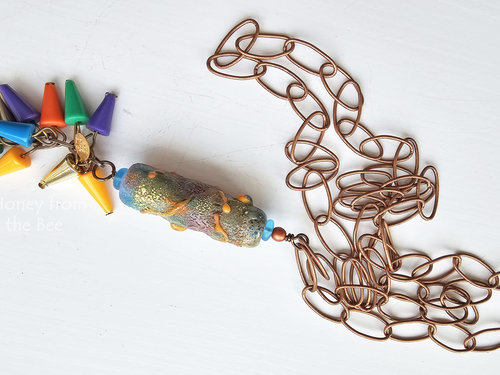 Tunic length necklace is all about the party!