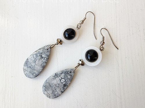 Grey and white earrings with pop of black