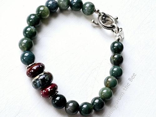 Dark teal and green moss agate bracelet with red lampwork