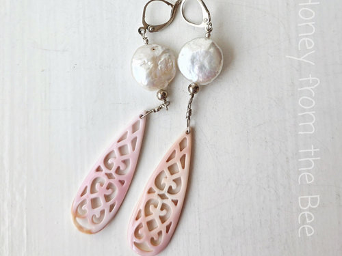 Pink and white earrings feature coin pearls