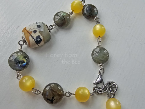 Grey and yellow beaded bracelet