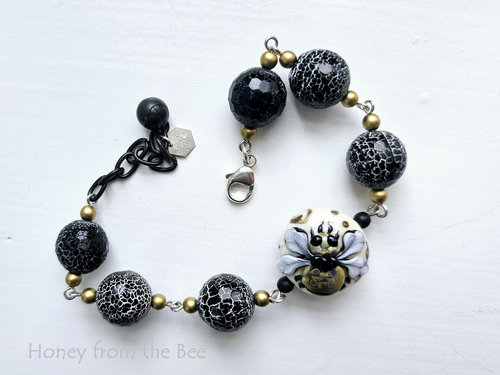 Black and white bead bracelet with honeybee focal