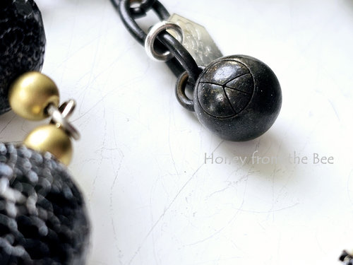 Peace symbol charm on honeybee bracelet