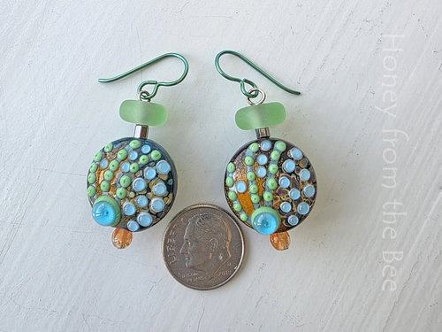 Ocean inspired earrings in orange, teal and green