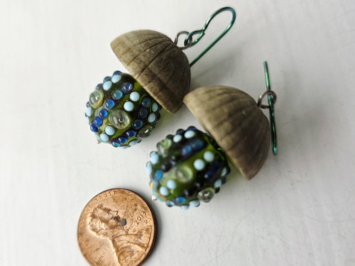 Mushroom shaped earrings feature lampwork in aqua and green