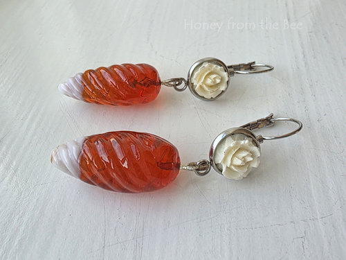 White rose earrings with vintage orange glass drop