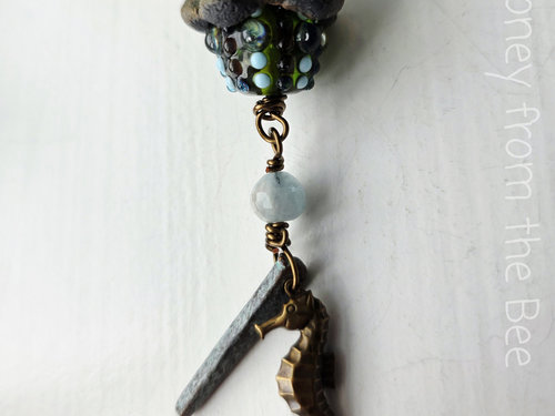 Seahorse charm dangles from this summer necklace