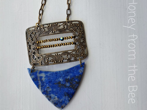 One of a kind statement necklace in gold and blue