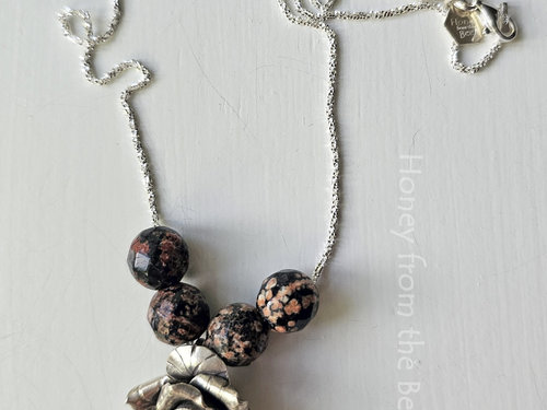 Silver Rose necklace with faceted gemstones