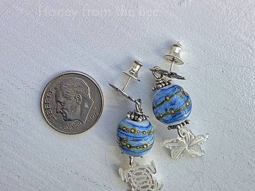 Silver and blue earrings with mother of pearl dangles