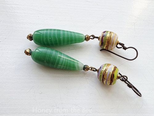 Vintage green glass drop earrings with striped lampwork