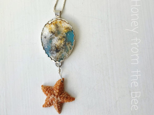 Starfish pendant with plume agate set in sterling silver