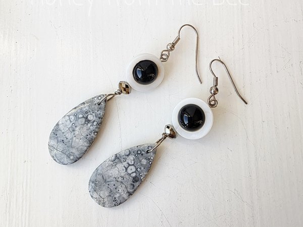 Grey and white earrings with pop of black