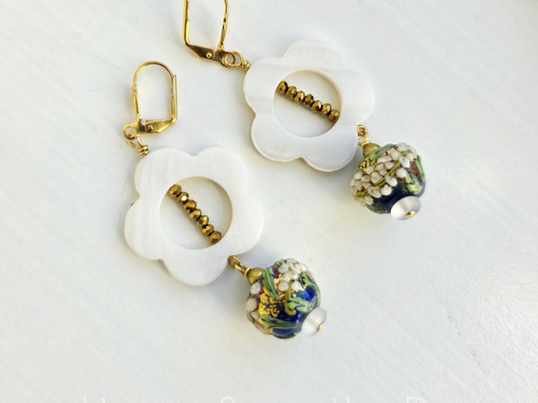Floral lampwork earrings in navy and white