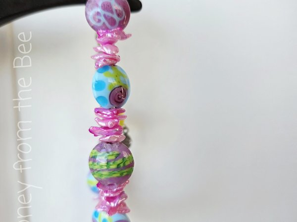 Keshi pearl bracelet in pink and blue and green features lampwork